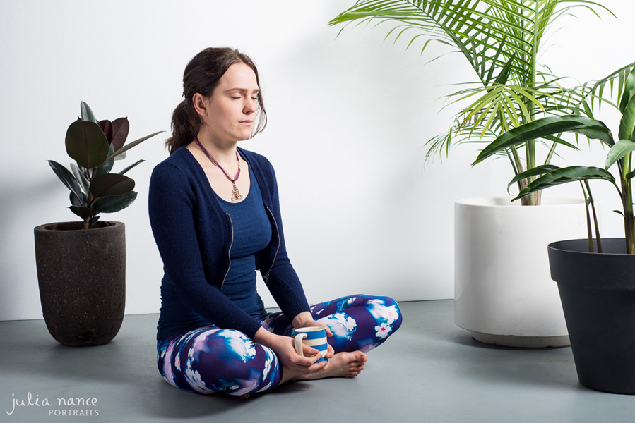melbourne corporate headshot photography of Tracy meditating with indoor plants