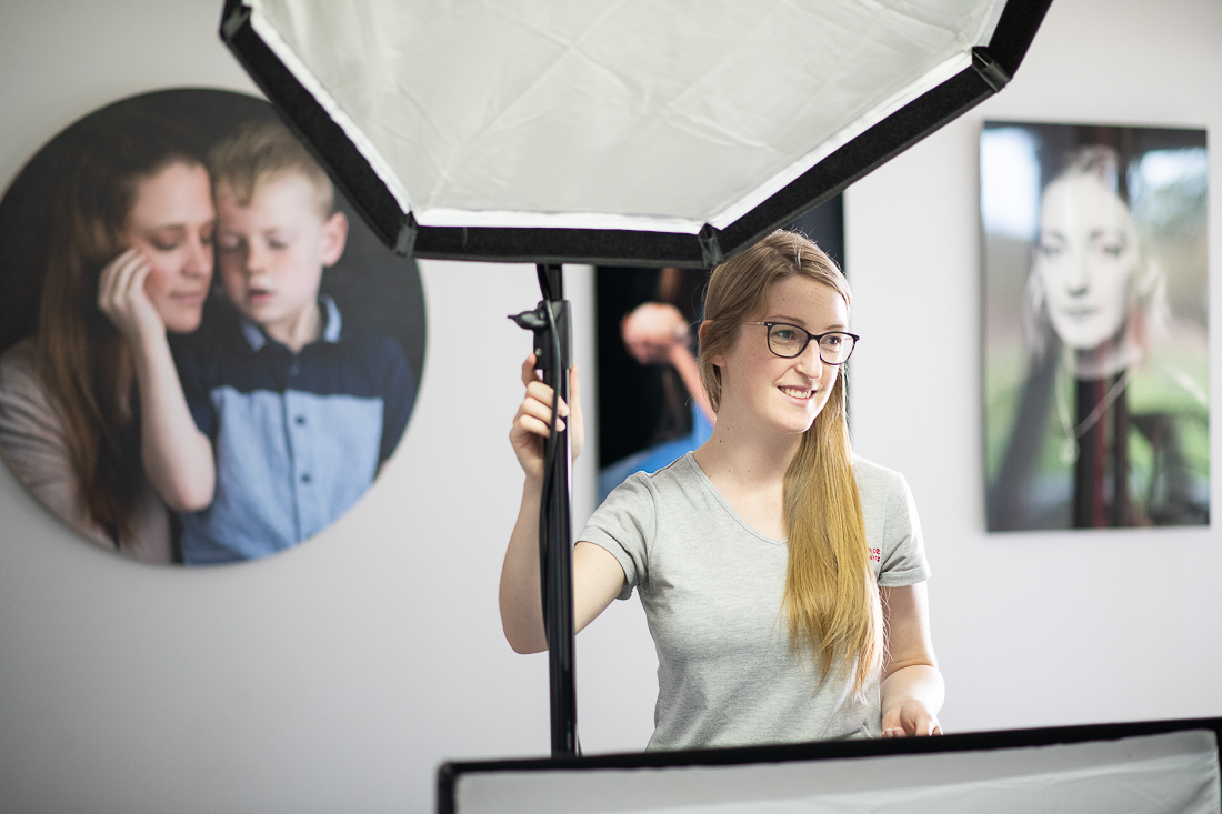 Julia Nance in her professional headshot photography studio, smiling