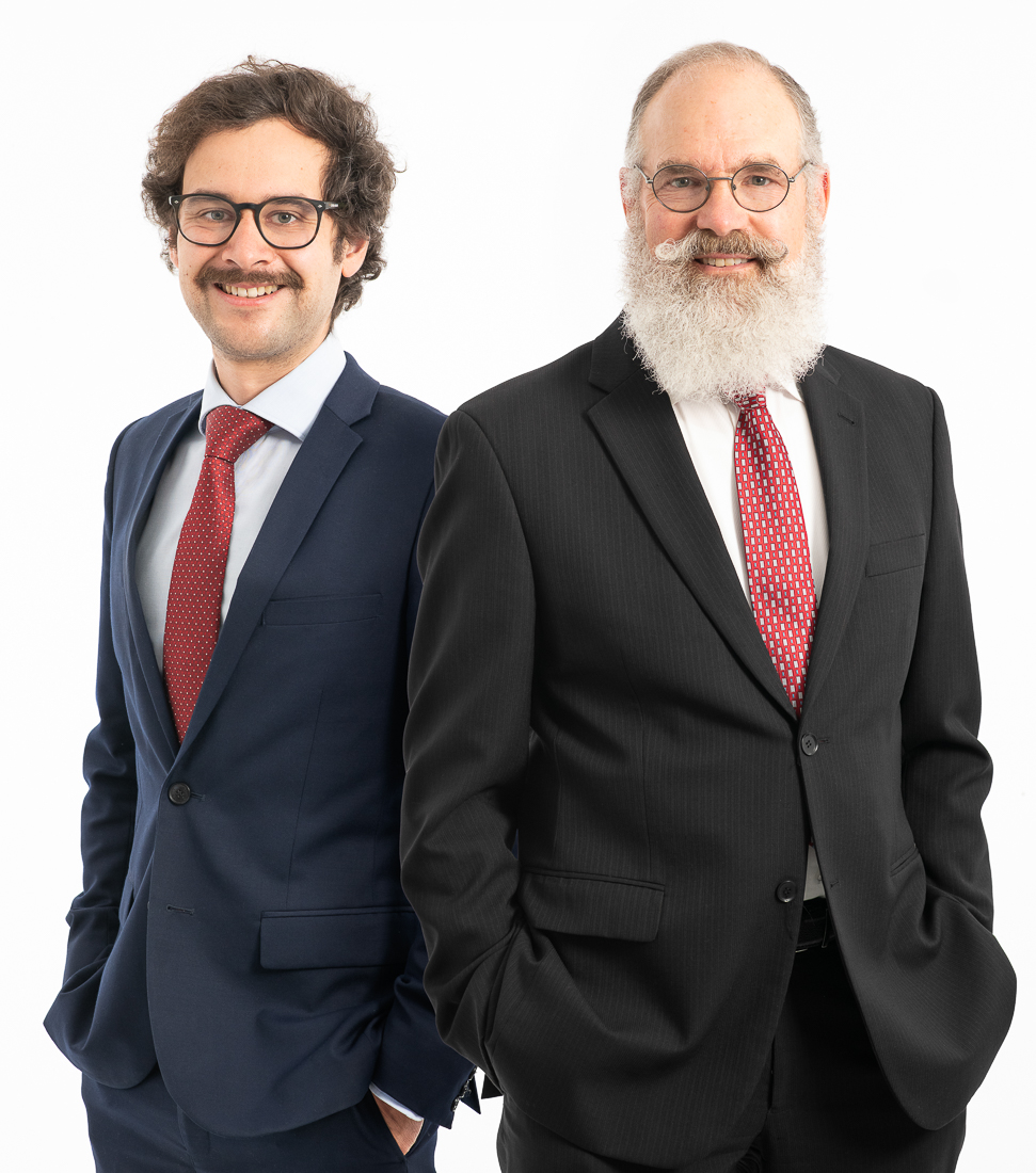 Corporate headshot and branding portrait of two Melbourne business owner in studio team portrait