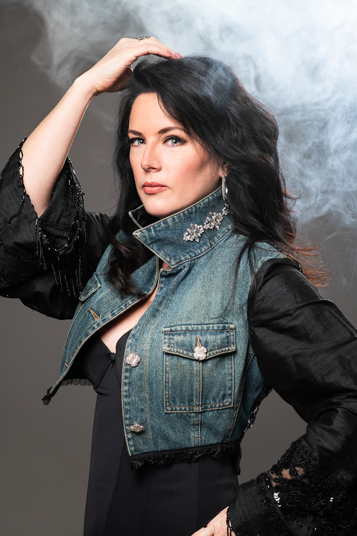 Personal branding headshot of melbourne creative business owner, taken in studio with smoke for theatrics.
