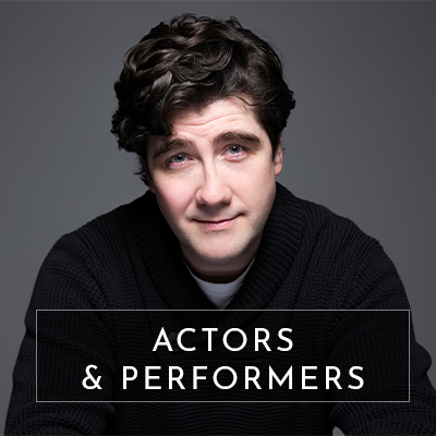 A studio actor headshot of man looking straight to camera. Text overlays the image saying "actors and performers"
