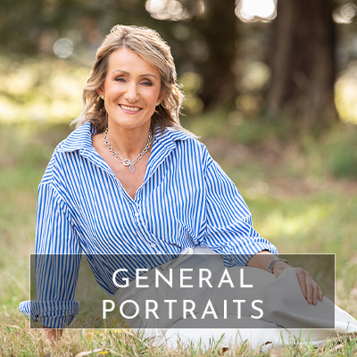 A woman sits in the outdoors with the sun behind her, smiling to camera. Text overlays the image saying "General portraits". This image is used to redirect you to a page with information for people needing general portrait for uses such as dating profiles.