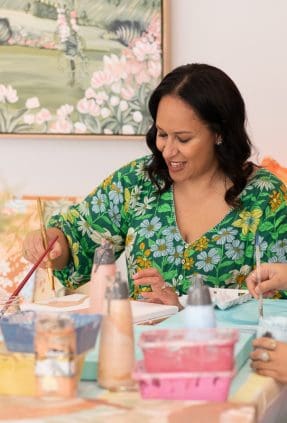 Local artists paint in their Melbourne gallery space, for a personal branding portrait.